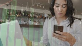 Animation of statistical data processing over woman using smartphone at a bar. Business data technology concept - Powered by Shutterstock - Get 15% off with code: PIKWIZARD15