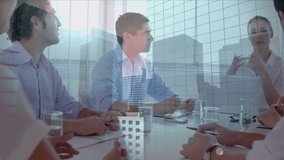 Animation of cityscape over diverse business people in office. Global business, finance, computing and data processing concept digitally generated video. - Powered by Shutterstock - Get 15% off with code: PIKWIZARD15