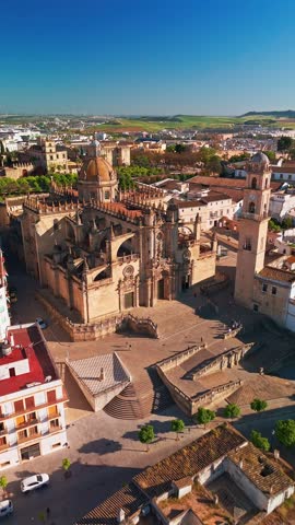 Aerial view of Jerez de la Frontera town in Andalusia, Spain. Jerez Cathedral and historic Moorish Alcazar de Jerez de la Frontera at sunset in Andalucia