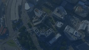 Animation of illuminated pink abstract pattern over aerial view of skyscrapers with moving vehicles. Digital composite, multiple exposure, cityscape, highway, transportation and technology concept. - Powered by Shutterstock - Get 15% off with code: PIKWIZARD15