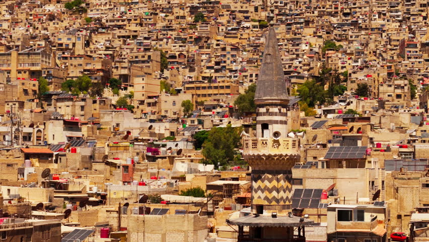 4K drone video showing an aerial view of Damascus, Syria.