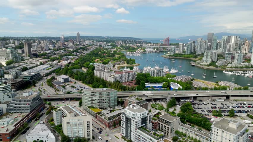 Cambie Bridge Over False Creek In Downtown Vancouver In British Columbia, Canada. Aerial Rotate Shot