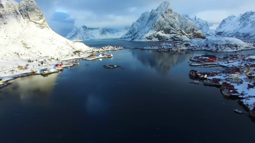 Aerial view of Lofoten island Norway. The winter season of the fishing village of Reine,aerial view while snowing