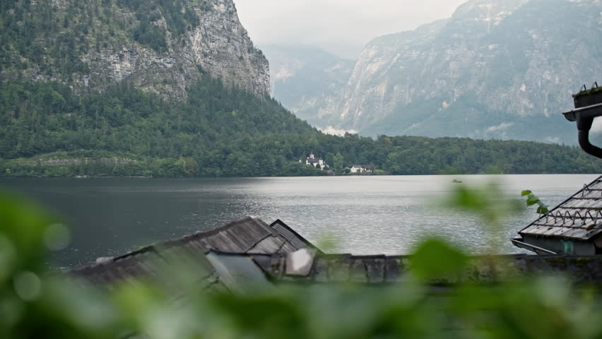 Traditional architecture and streets of Hallstatt Austria. Urban landscape of houses on the shore of an Alpine lake.