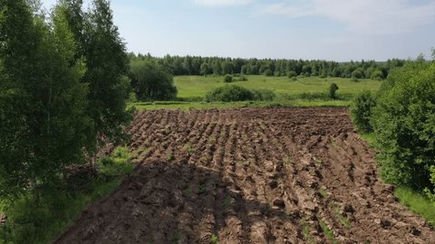 Fast Low Drone Orbit over Plowed Field