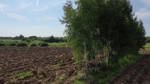 Vertical Drone Takeoff over Plowed Field near