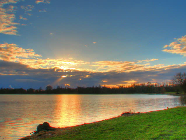 Sunset over lake banks, HD time lapse clip, high dynamic range imaging