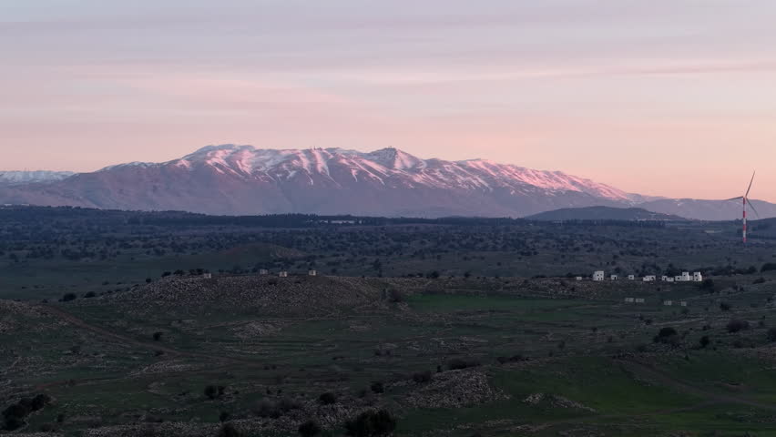 Aerial Mount Hermon mountain range at sunset Israel

Drone footage shows Mount Hermon snowy peaks Israel on 20 January 2026 dusk light
