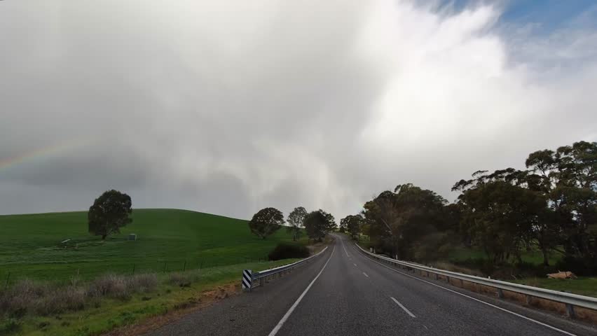 Driving the Wilkins Highway at Belalie East with an approaching storm