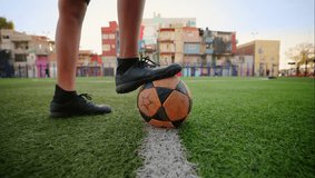 Soccer player dribbles the ball across a grassy field, showcasing athletic skill, speed, and focus during an outdoor football training or match. - Powered by Shutterstock - Get 15% off with code: PIKWIZARD15