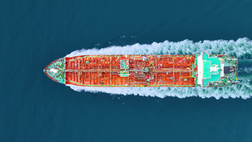 Oil tanker ship. Red Oil Tanker runing in the ocean sea. petroleum ship transportation import export fuel energy Vessel transport Gas. featuring complex red piping systems liquid petroleum fuel.