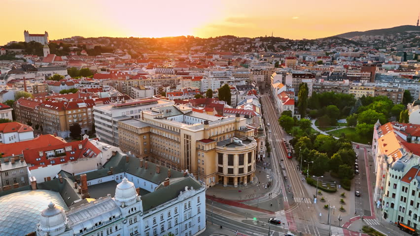 Scenery of old town in Bratislava, Slovakia. Historical buildings in the light of setting sun. Aerial view.