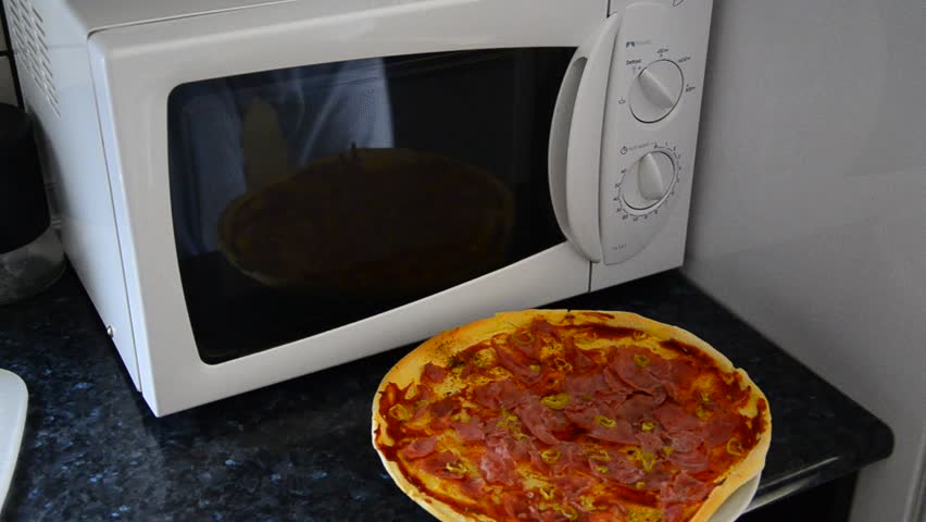 microwave oven pizza preparation home kitchen