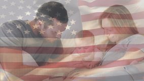 Animation of flag of usa waving over surgeon in operating theatre. Global medicine healthcare services during covid pandemic concept digitally generated video. - Powered by Shutterstock - Get 15% off with code: PIKWIZARD15