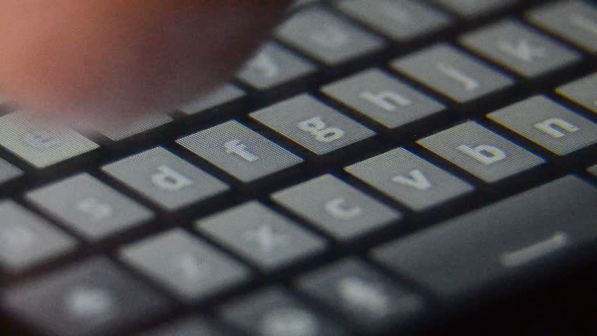 smart phone touch screen display finger typing. Extreme close up, macro