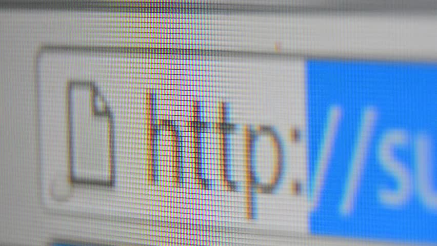http www address bar. Close up of mouse cursor typing in web browser address bar