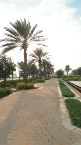 Views of the Oriental Palace. Architectural elements of buildings, arches and columns, windows and doors. On the streets of the Abu Dhabi, in public spaces.