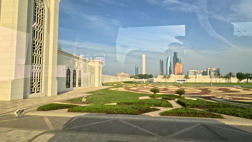 Views of the Oriental Palace. Architectural elements of buildings, arches and columns, windows and doors. On the streets of the Abu Dhabi, in public spaces.