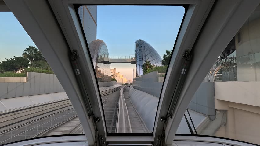 City views, Metro and rails. Skyscrapers and roads, streets and buildings. On the streets of Dubai, in a public place.