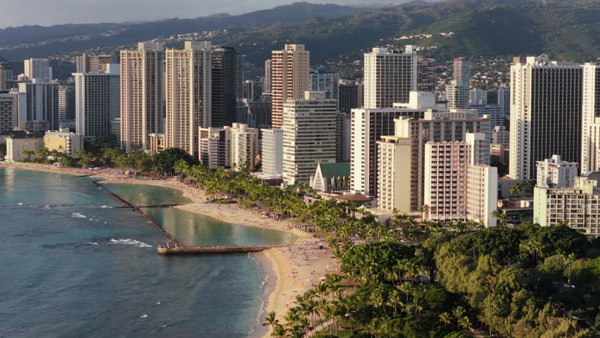 Waikiki Beach aerial view, tall buildings by the ocean coast, Honolulu city , Hawaii