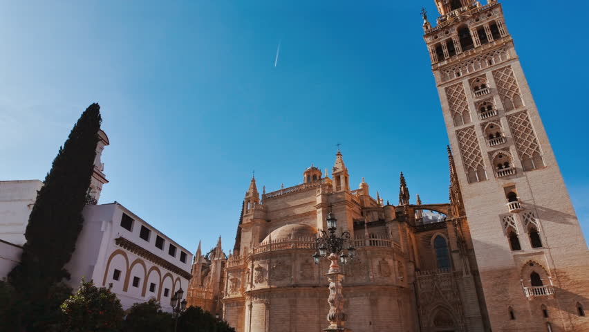 Seville Cathedral and Giralda, Seville, Andalusia, Spain, a majestic Gothic cathedral with the iconic bell tower showcasing rich history and art
