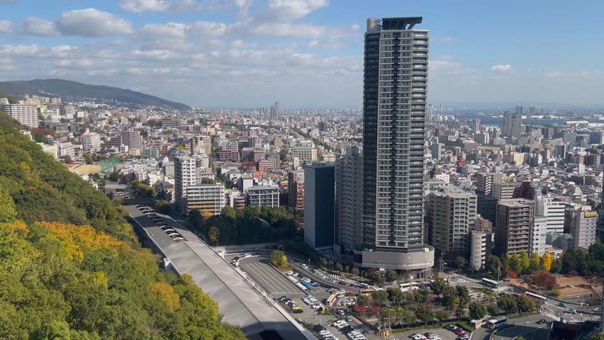 Kobe Japan city skyline from descending Nunobiki Ropeway gondola car