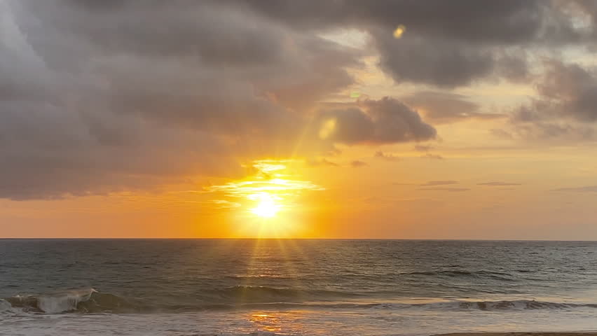 Golden Sunset Over the Ocean With Sun Rays.