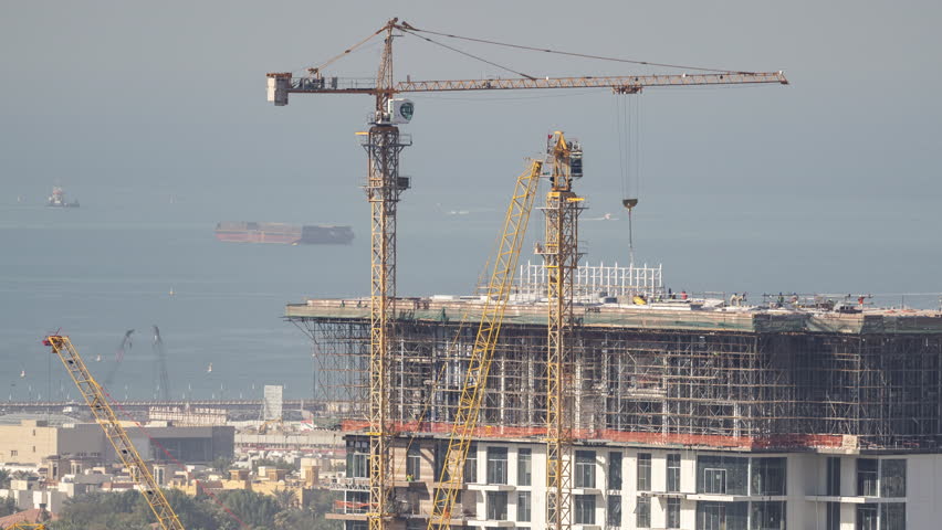closeup timelapse of construction of a new skyscaper in dubai 