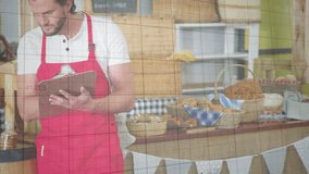 Animation of financial graphs over caucasian male seller in bakery. economy, finance, shopping and small independent business concept digitally generated video. - Powered by Shutterstock - Get 15% off with code: PIKWIZARD15