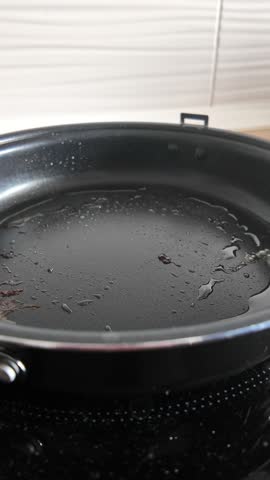 Cooking sausage in frying pan