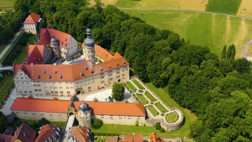 Aerial panorama view of the old town and the palace Weikersheim in Germany on a sunny spring day