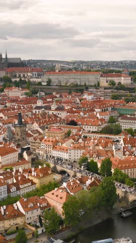 Aerial View of Prague Cityscape with Charles Bridge and Prague Castle. Vertical Video