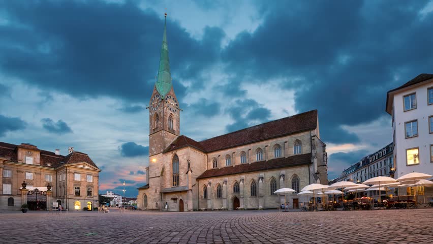 Zurich, Switzerland. View of Fraumunster Church (Kirche Fraumunster) at dusk (static image with animated sky)
