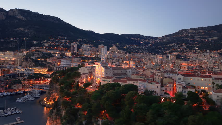 Aerial Hillside Skyline And Coastal Bay Drone Sweeps Across Ornate Palace. Monaco