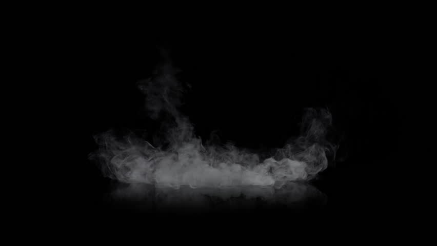 Super Slow Motion Shot of Smoke Cloud Slowly Floating Isolated on Black Background at 1000fps.