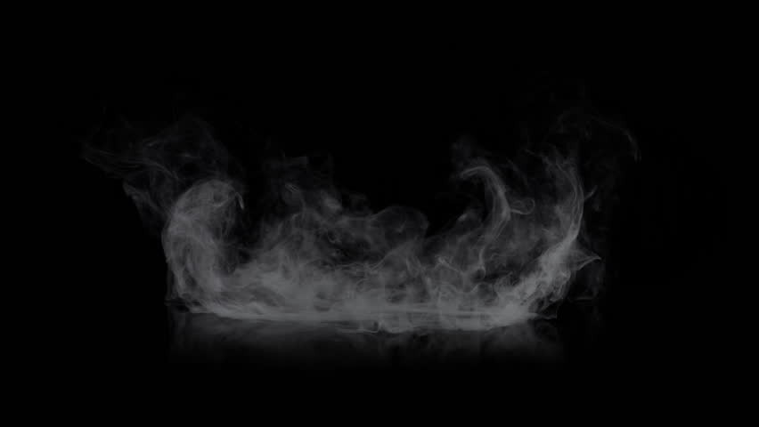 Super Slow Motion Shot of Smoke Cloud Slowly Floating Isolated on Black Background at 1000fps.