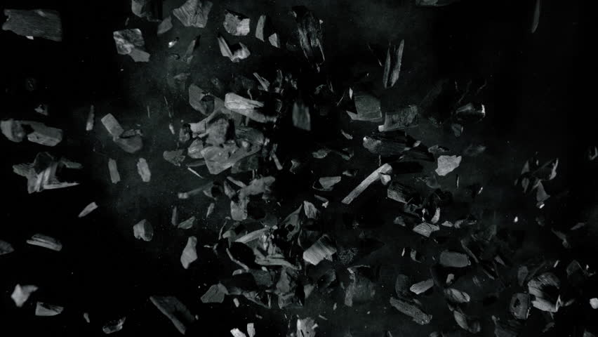 Super Slow Motion of Black Charcoal Colliding in Mid-Air at 1000 fps.