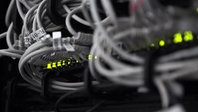 Close-up of network cables inside a data center, representing information technology infrastructure, data transfer, connectivity, and digital communication systems. - Powered by Shutterstock - Get 15% off with code: PIKWIZARD15