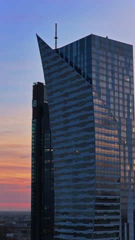 Aerial drone view of the distinctive angular Skyliner skyscraper, located at Rondo Daszynskiego in the rapidly developing Warsaw business district. Vertical
