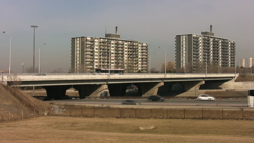 Bridge overpass and traffic on Highway 401. Toronto, Canada. 