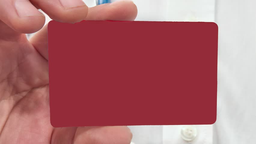 A doctor wearing a white coat and stethoscope holds a red rectangular card. The words Reduce Risk progressively appear on the card, emphasizing a crucial health message