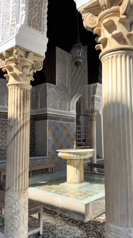 4K Vertical cinematic view of Al-Quaraouiyine University in Fez, Morocco. Oldest university in the world with stunning Islamic architecture.