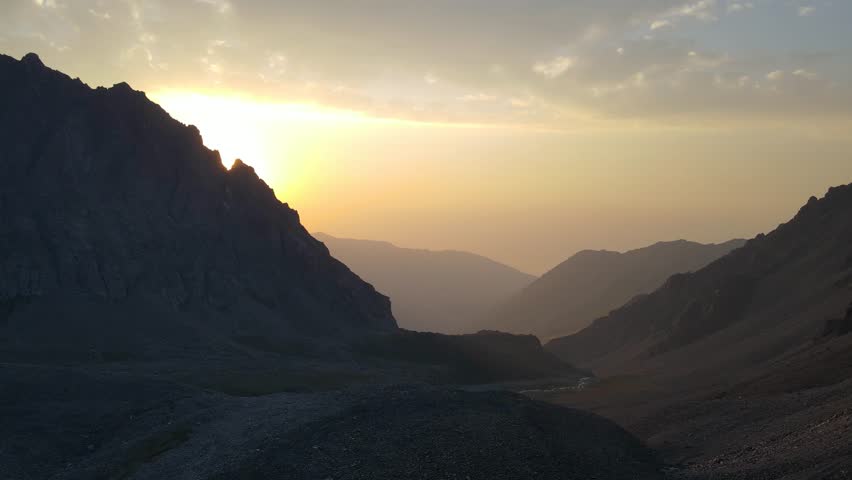 a beautiful sunset in a mountain gorge. evening in the mountains