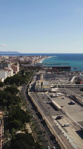 Vertical aerial flyover capturing the terminals of the Port of Almería along the Andalusia coastline in southern Spain.