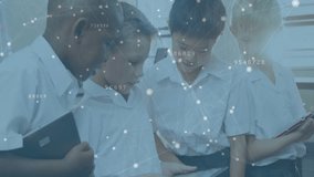 Children using tablets, digital data network animation over classroom background. Technology, education, e-learning, students, learning - Powered by Shutterstock - Get 15% off with code: PIKWIZARD15