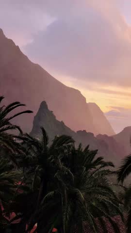 Landscape of the Masca valley in Tenerife, Canary island, Spain. Scenic mountain landscape with palm trees and tropical vegetation in Tenerife. Famous volcanic rock formation in Masca village