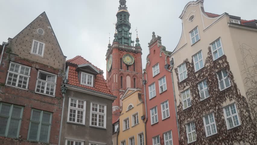 Cinematic video of Gdansk architecture filmed during cold winter sunset. The most colourful city in Poland. High resolution video. Small and beautiful city full of history, beautiful corners, markets and people. Cinematic movement. City where WW2 started. 