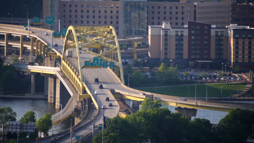Traffic passes over the Fort Duquesne Bridge over the Allegheny River in
