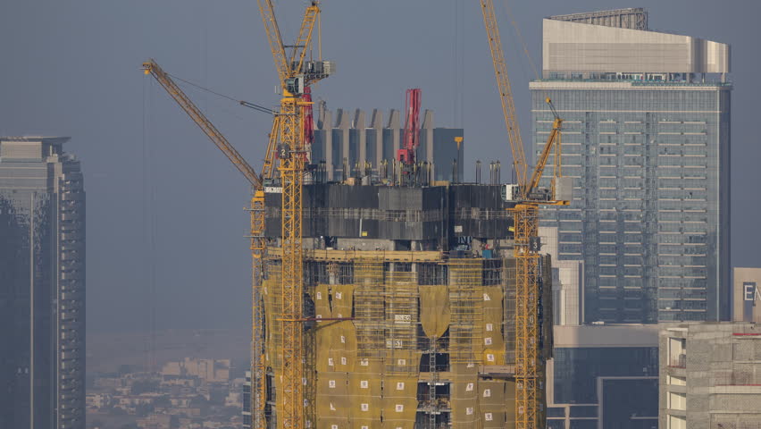 closeup timelapse of construction of a new skyscaper in dubai 