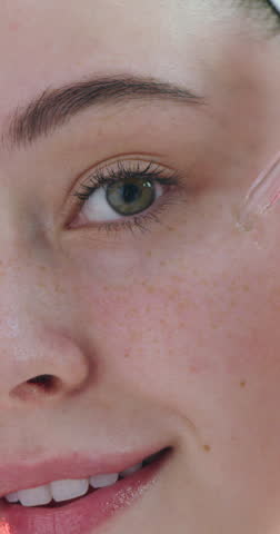 Happy woman, face and skincare with dropper for vitamin C oil, beauty serum or cosmetics. Portrait, closeup or female person with smile, anti aging or hyaluronic acid for skin hydration or collagen